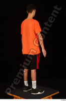  Danior black shorts black sneakers dressed orange t shirt shoes sports standing whole body 0006.jpg
